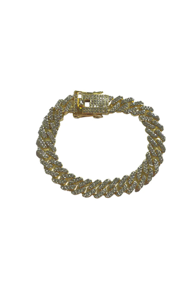 a gold bracelet with a clasp on a white background
