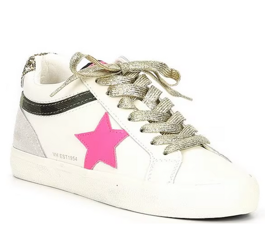 a white sneaker with a pink star on the side