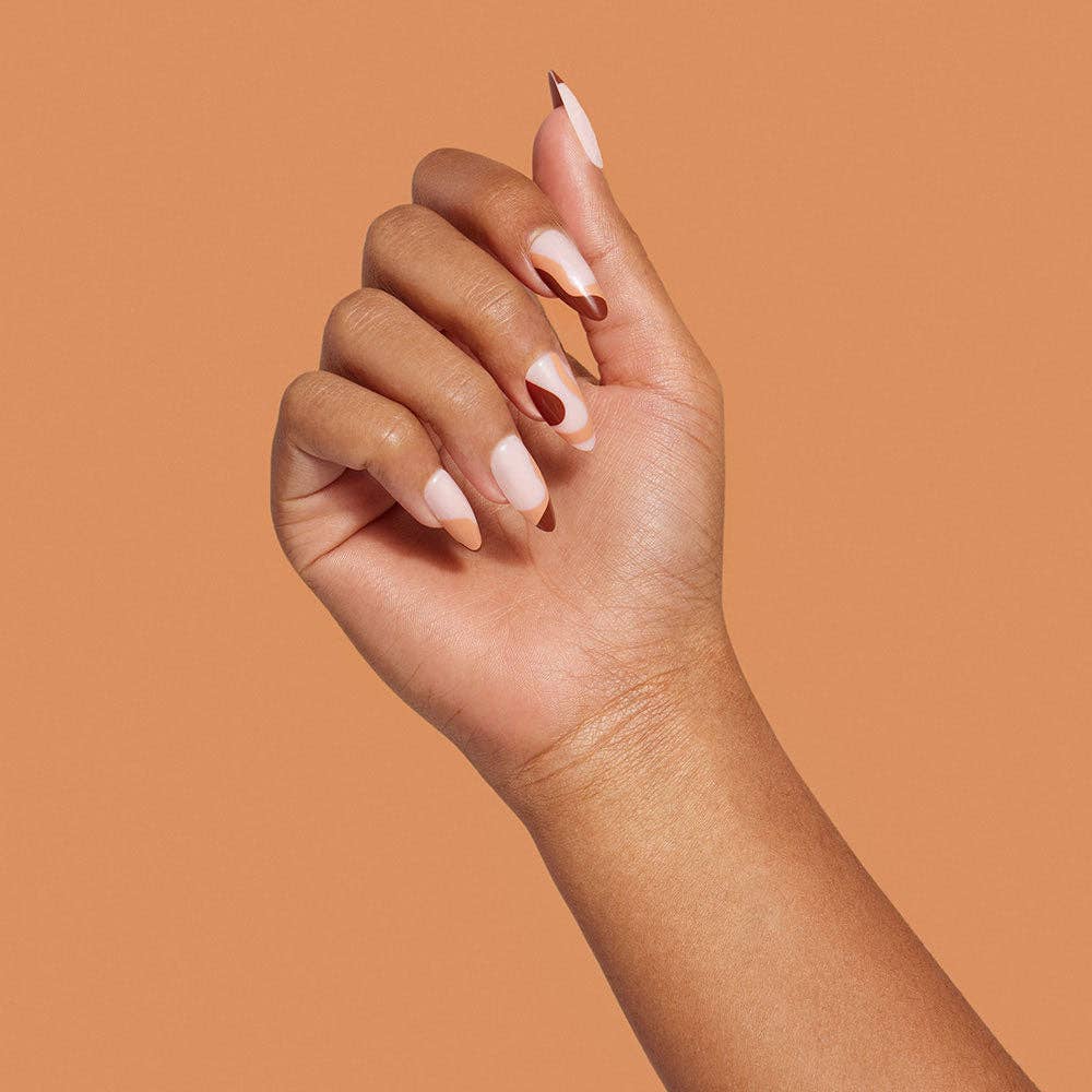 a woman's hand with a manicured manicure