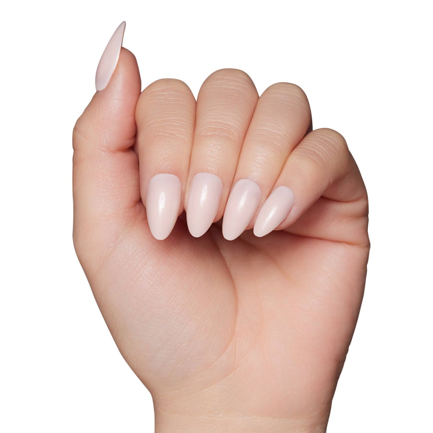 a woman's hand with a white manicure on it