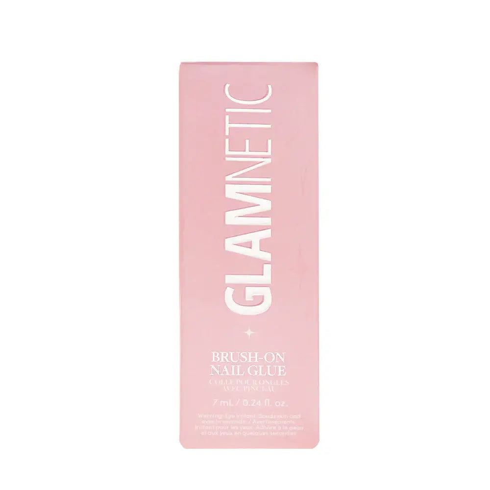 a pink tube of glam cosmetics on a white background