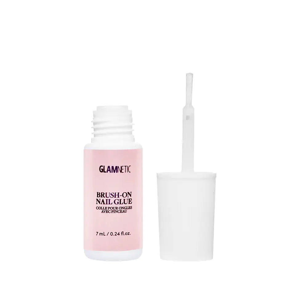 a bottle of glame it brightening eye gel next to a glass of